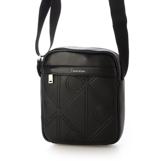 EMBLEM AOP EMBOSS REPORTER （BLACK）