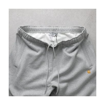 カーハート Carhartt Carhartt WIP スウェットパンツ Chase Sweat Pant I037458 （00MXX/Grey-Heather/Gold）｜詳細画像