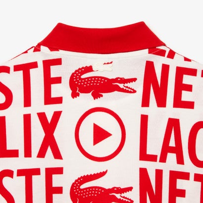 ラコステ LACOSTE 『Lacoste x Netflix』 オーバーサイズ総柄ポロシャツ （レッド）｜詳細画像