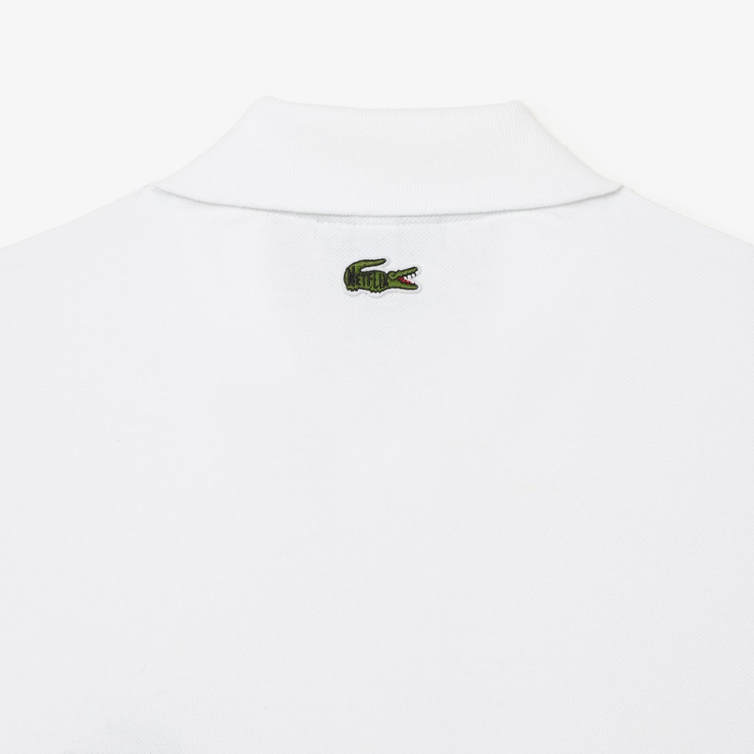 ラコステ LACOSTE 『Lacoste x Netflix』 ポロシャツ （ホワイト系