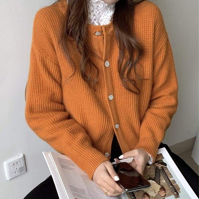 程よいフィット感でコンパクトに着こなせるワッフルニットカーディガン （オレンジ）