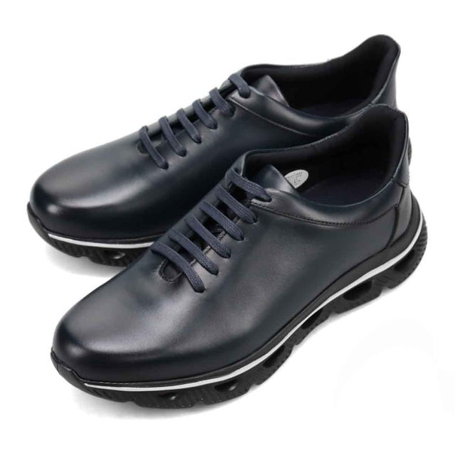 「Recovery Shiatsu Insole」搭載で指圧効果により血行を115％促進。 COVEROS レザースニーカー （ネイビー）