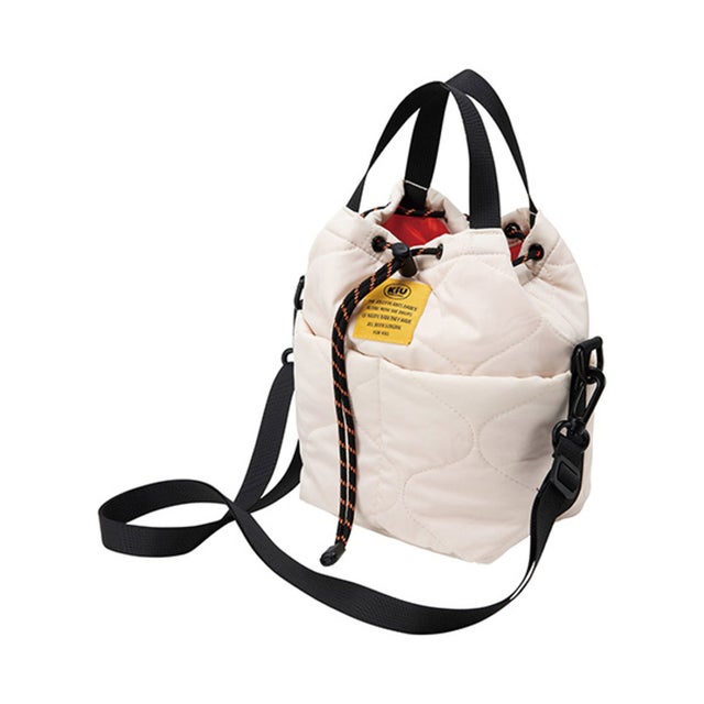 KiU PADDED POCKETFUL MINI BAG K384 （アイボリー）