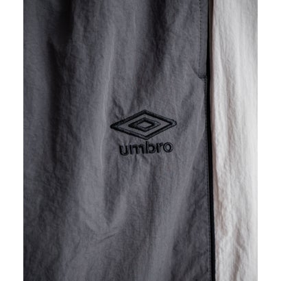 UMBRO アンブロ ナイロンパンツ トラックパンツ メンズ レディース イージー リラックス ウエストゴム 裾スピンドル パイピング 切替デザイン 16394 （ブラック）｜詳細画像