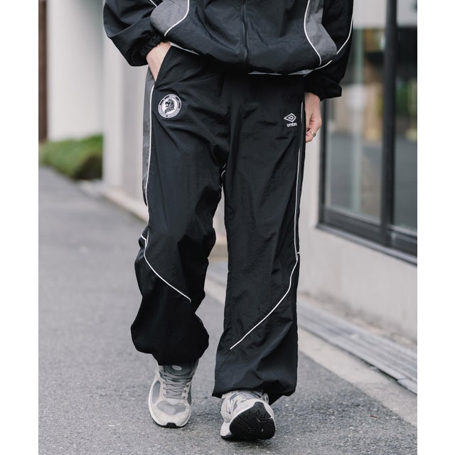 UMBRO アンブロ ナイロンパンツ トラックパンツ メンズ レディース イージー リラックス ウエストゴム 裾スピンドル パイピング 切替デザイン 16394 （ブラック）