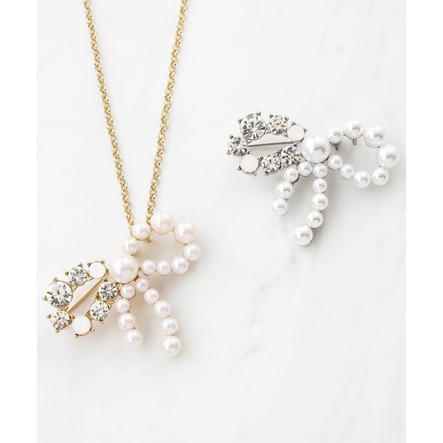 RIBBON BROOCH NECKLACE ブローチネックレス （ゴールド系）